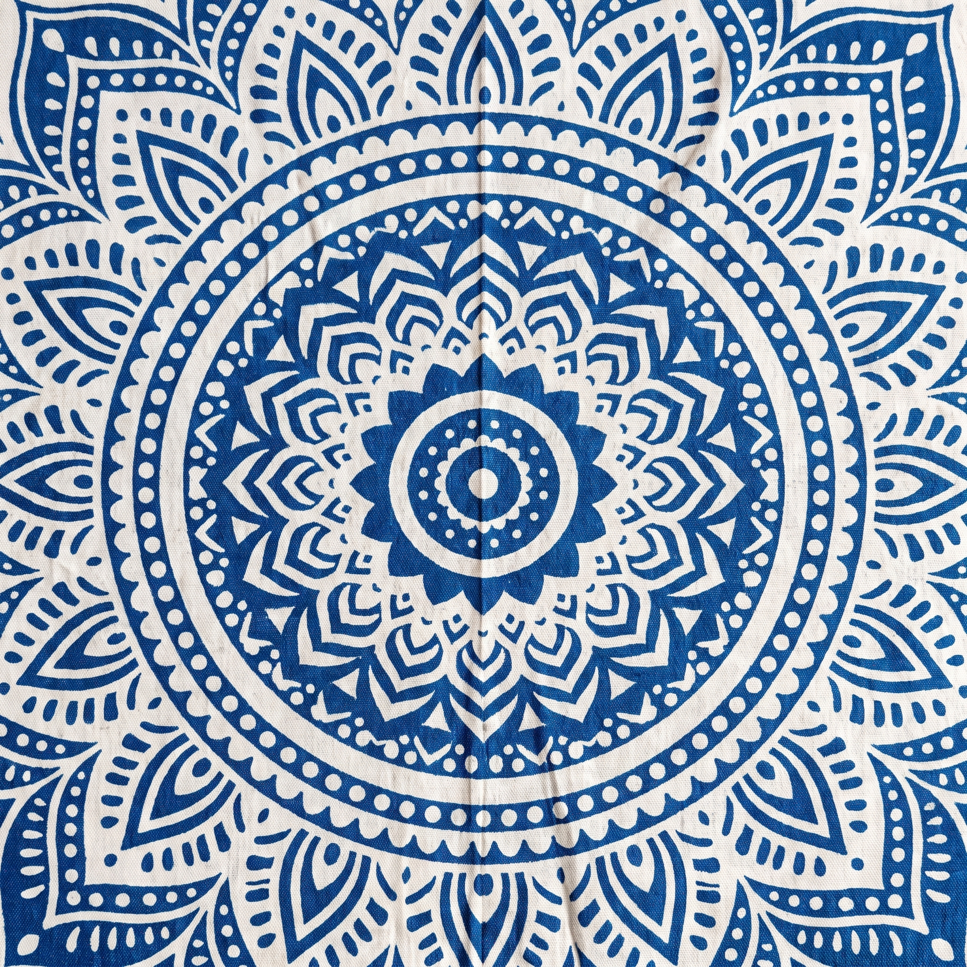 Blue ombre lotus mandala tapestry hung as a wall hanging