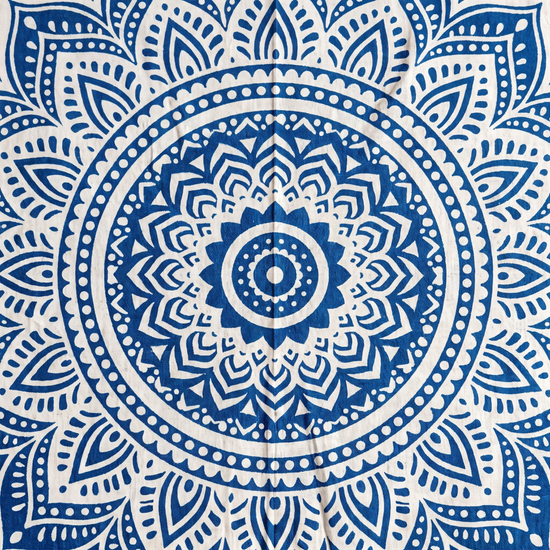 Blue ombre lotus mandala tapestry hung as a wall hanging