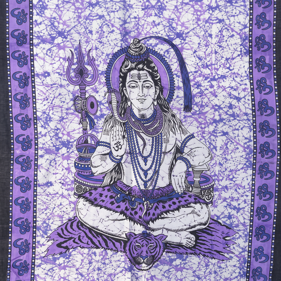 Close detail of the trident and tiger skin on the violet Shiva batik tapestry